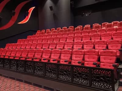 Red seats in Novo Cinemas Msheireb Doha auditorium.