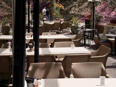 Outdoor seating at Twisted Olive & Naama’s Garden, Doha.