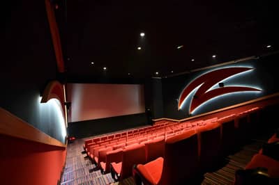 Wadi Al Sail Cinema interior with red seats, Manama.