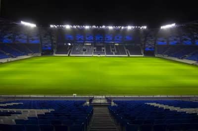 Al Nasr Al Maktoum Stadium in Dubai, empty at night.
