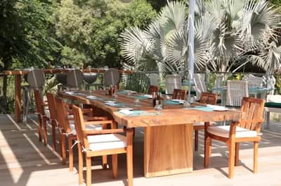 Outdoor dining area at The Farm Restaurant Al Barari, Dubai.
