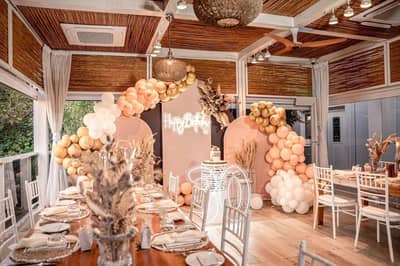 Elegant birthday setup at The Farm Restaurant Al Barari, Dubai.
