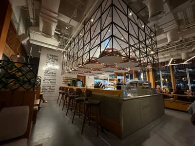 Jones the Grocer interior, modern design, Palm Jumeirah, Dubai venue.