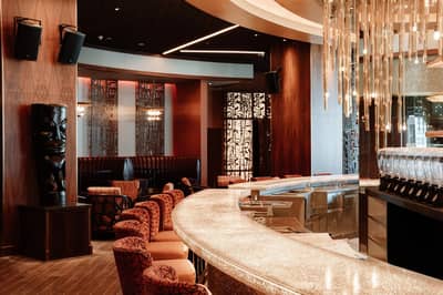 Elegant interior of Trader Vic's Palm Jumeirah, Dubai venue space.