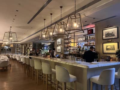 Elegant bar interior at Il Borro Tuscan Bistro Dubai.