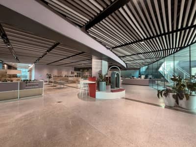 Modern interior with seating and plants at Terra, Expo City Dubai, Dubai, UAE