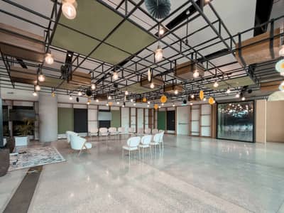Spacious event room with modern decor at Terra, Expo City Dubai, UAE.