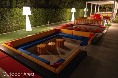 Colorful outdoor seating area at Aureum Club, Dubai, UAE
