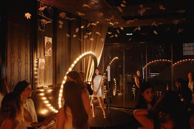 Elegant event space with illuminated decor at Nazcaa Japanese Peruvian Dubai, UAE.