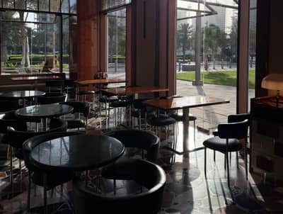Modern seating area at Coffeemania Dubai Hills Mall, Dubai, UAE