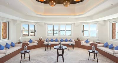 Elegant seating area with ocean view at Banana Island Resort Doha By Anantara.