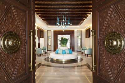 Elegant lobby with ornate doors at Souq Al Wakra Hotel, Doha, QATAR.