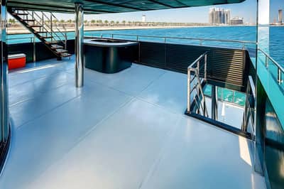 Spacious deck with stairs and railing at Royal Rave Yacht, Dubai, UAE