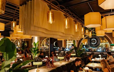 Elegant dining area with warm lighting at The Banc Dubai, Dubai, UAE