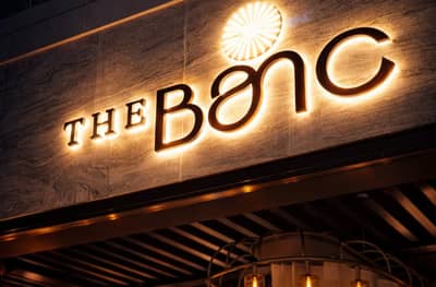 Illuminated entrance sign at The Banc Dubai, Dubai, UAE