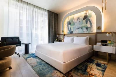 Elegant guest room at Voco Dubai Nice The Heart of Europe, Dubai, UAE