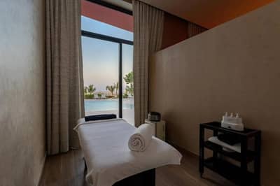 Spa treatment room with pool view at Voco Dubai Nice The Heart of Europe