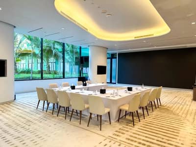 Conference room with large windows at Voco Dubai Nice The Heart of Europe, Dubai.