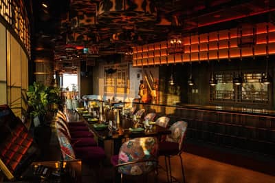 Elegant dining area with decorative lighting at Asia Asia The Palm, Dubai, UAE