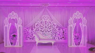 Elegant stage setup with ornate decor at Sadeem Celebrations Hall Abha, Saudi Arabia