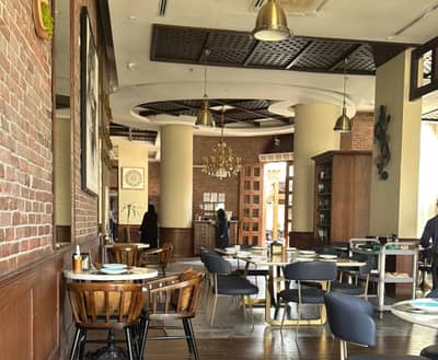 Elegant dining area with chandeliers at Soul Restaurant Al Bahah, Al Bahah, Saudi Arabia.