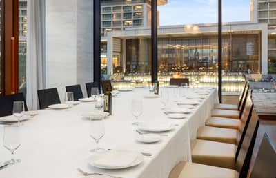 Elegant dining setup at Estiatorio Milos Dubai, Dubai, UAE