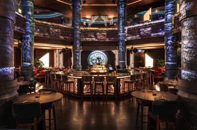 Luxurious interior with central bar at AMARU Dubai, Dubai, UAE