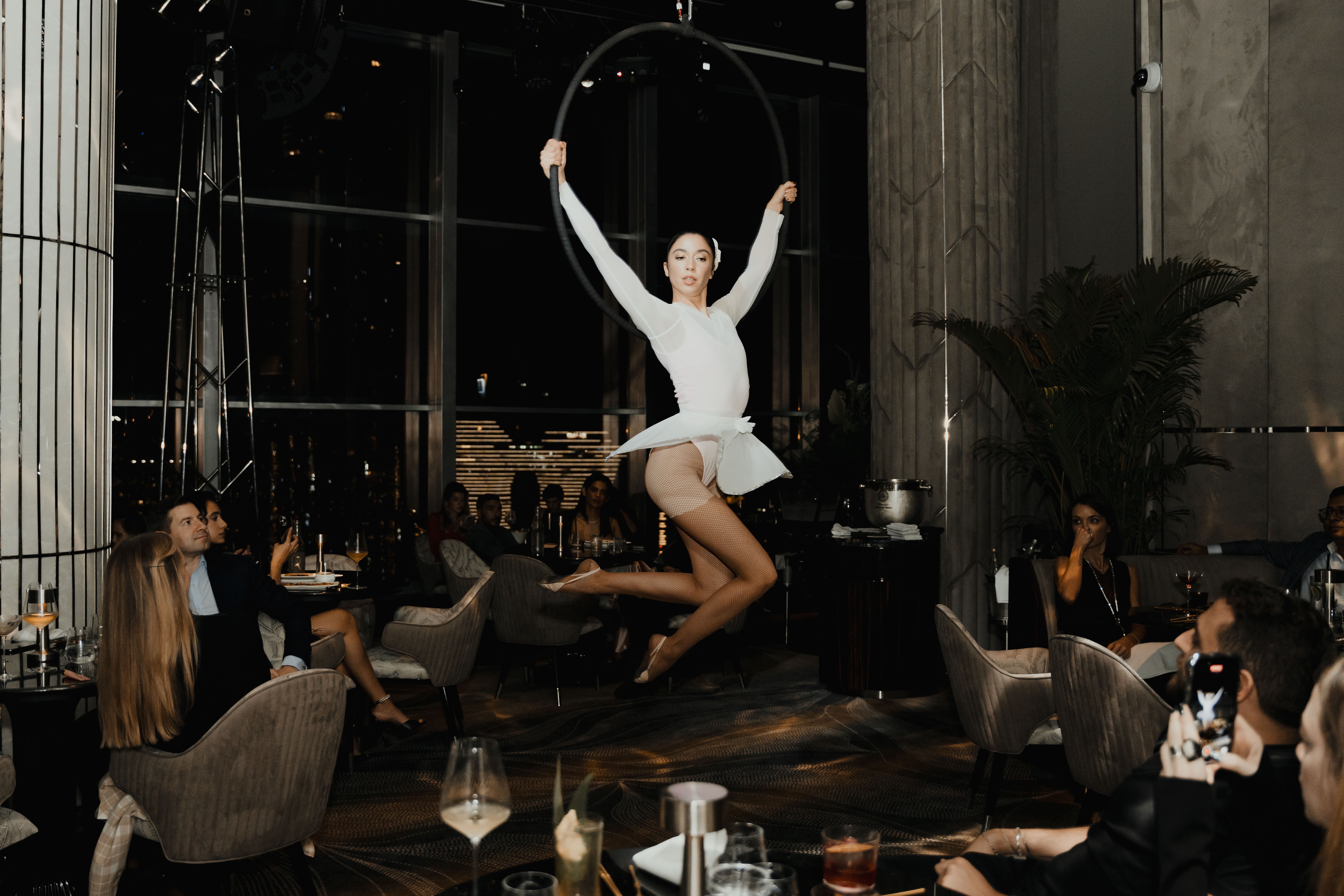 Aerial performer at Birds Dubai venue during an event.